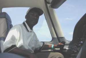 Jamail at the controls of a Cirrus SR20