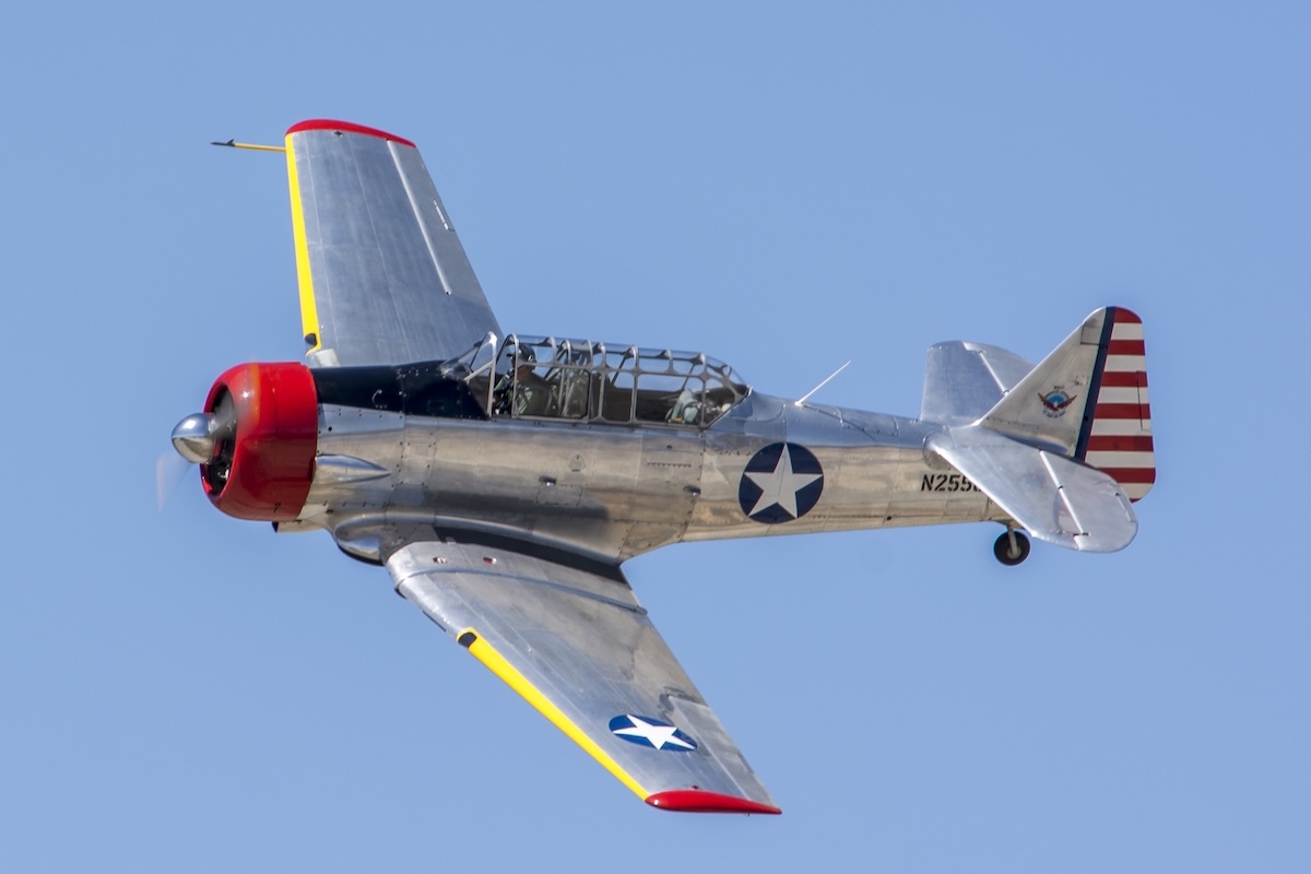 A T-6 banks to the left