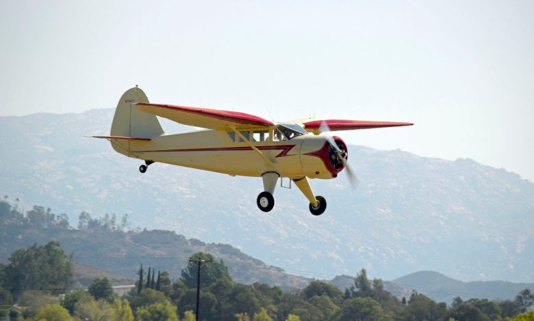Charlie Muecke flying his newly restored Stinson Reliant