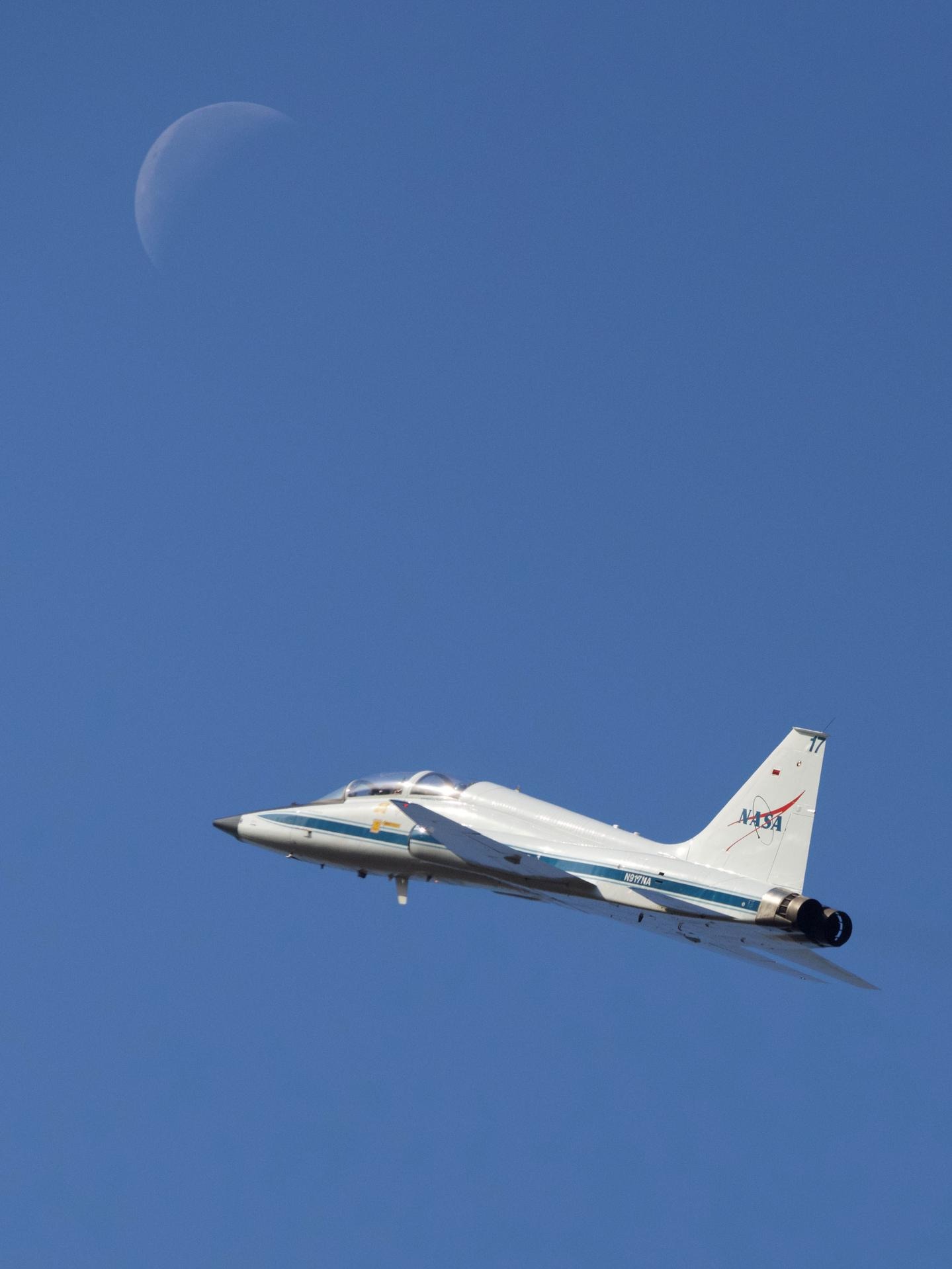 Artemis II astronauts train under a waning crescent Moon