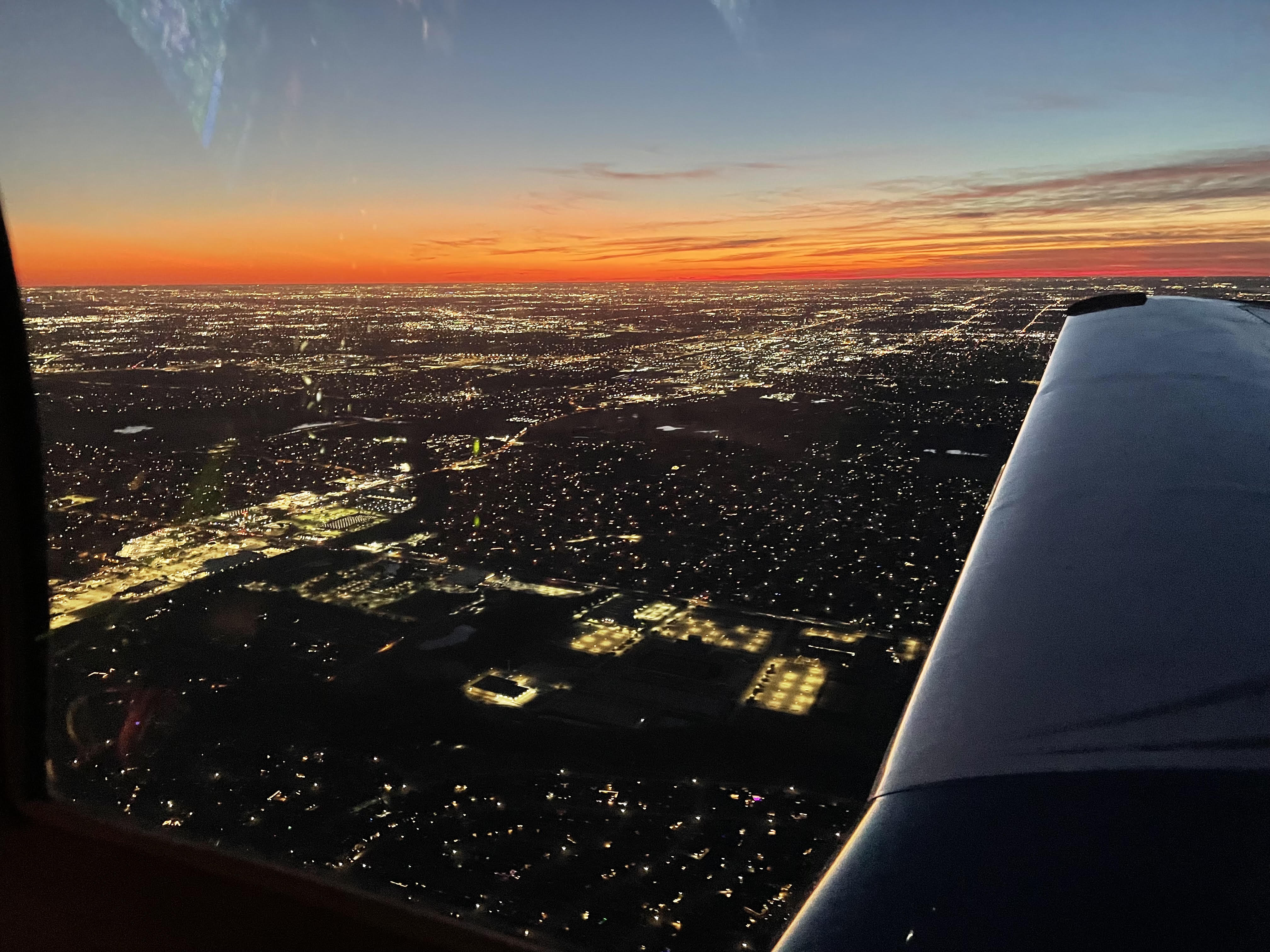 Mooney M20J Winging South over Dallas Sunset
