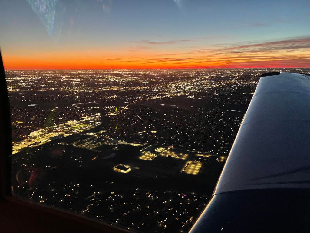 Mooney M20J Winging South over Dallas Sunset