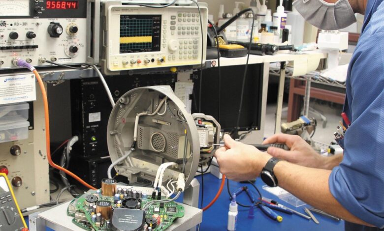 Technician working on used avionics